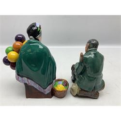 Two Royal Doulton figures, comprising The Master no.HN2325 and The Old Balloon Seller no. HN1315, together with five Royal Doulton character jugs
