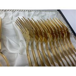 Bestecke Solingen canteen of gold plated cutlery for twelve place settings, including ladle, cake slice and serving spoons, contained within a briefcase, together with a matching set twelve of Bestecke Solingen gold plated fish knives and forks, in fitted case 