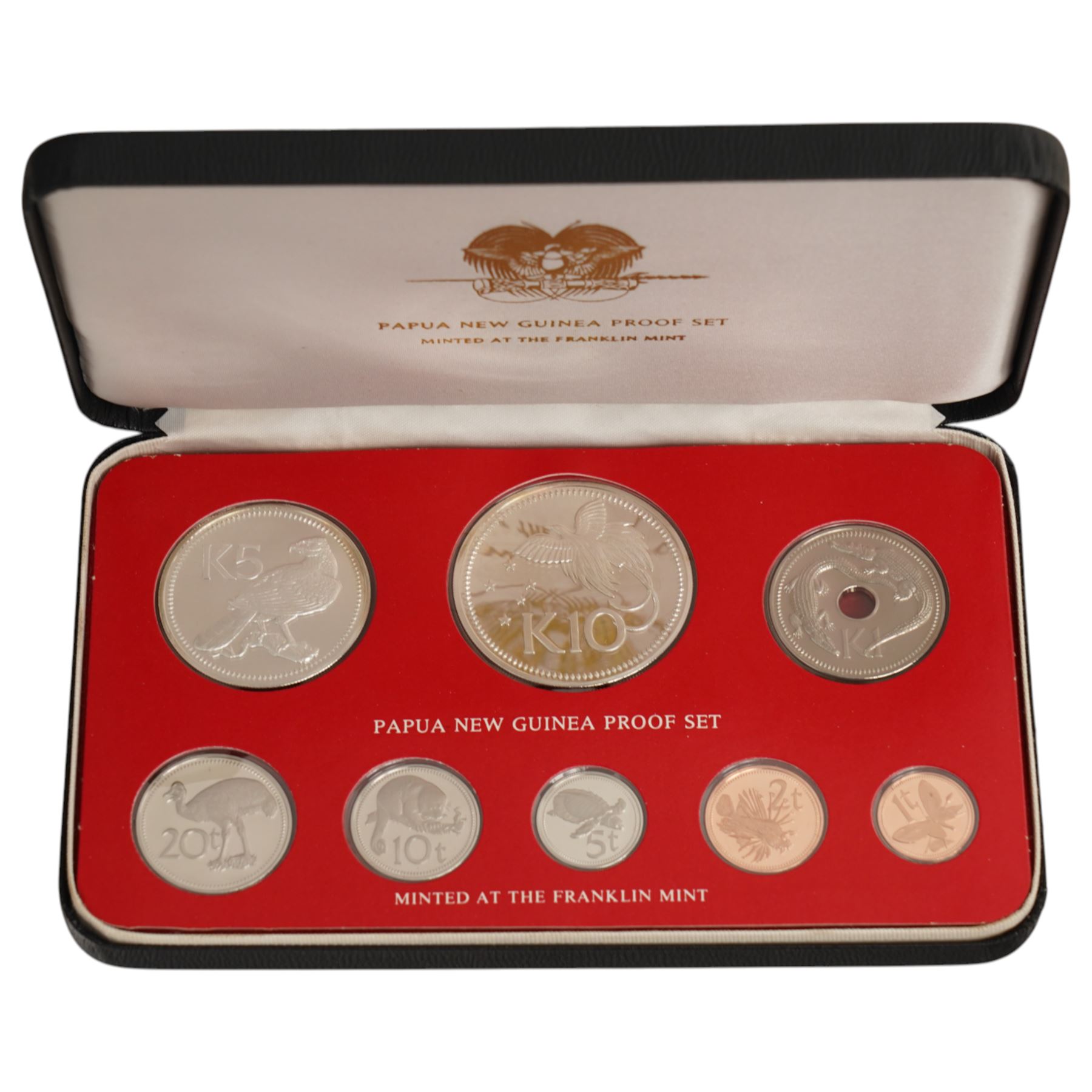 Three international proof coin sets produced by The Franklin Mint and containing high denomination silver coins, comprising Republic of Seychelles 1976 eight coin set, Republic of Panama 1976 nine coin set, Papua New Guinea 1976 eight coin set; four silver proof one ounce coins; eight Royal Mint international year sets, etc