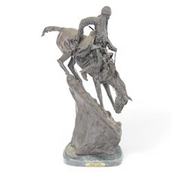 After Frederick Remington; The Mountain Man bronzed figure of a native American trapper up...