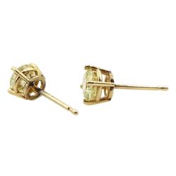 Pair of gold round brilliant cut diamond stud earrings, stamped 14K, total diamond weight approx 1.05 carat