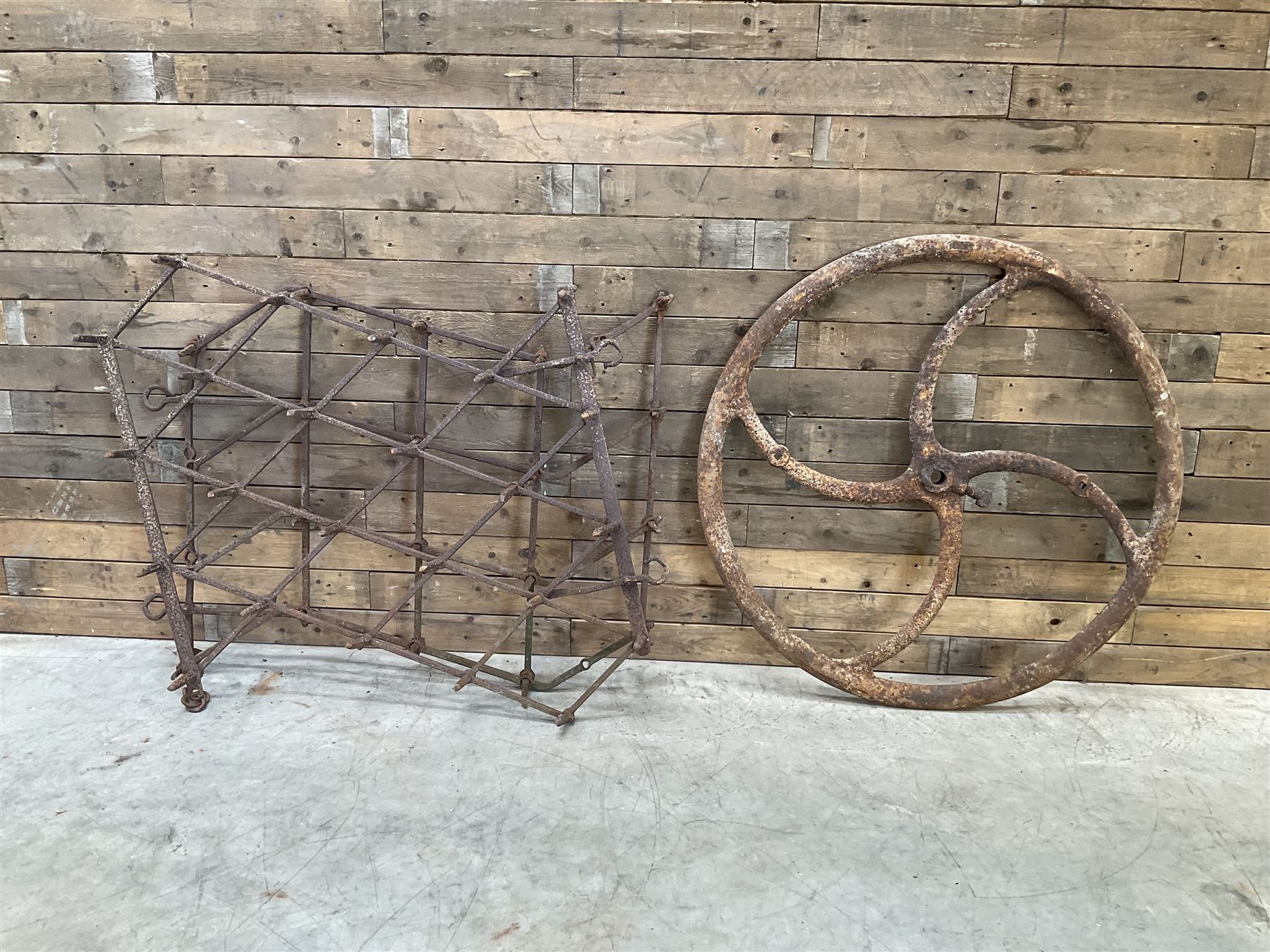 Two vintage agricultural harrows and cast iron machinery wheel/gear