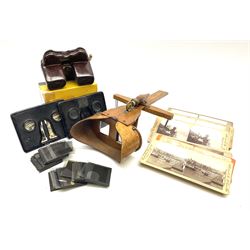 Victorian hand-held maple stereoscopic viewer bearing dates 1883 and 1895; eighteen stereoscopic cards by Keystone, Meadville etc; boxed Stereo-rama bakolite View Master; two other japanned metal hand-held stereoscopic viewers; and quantity of small glass negatives