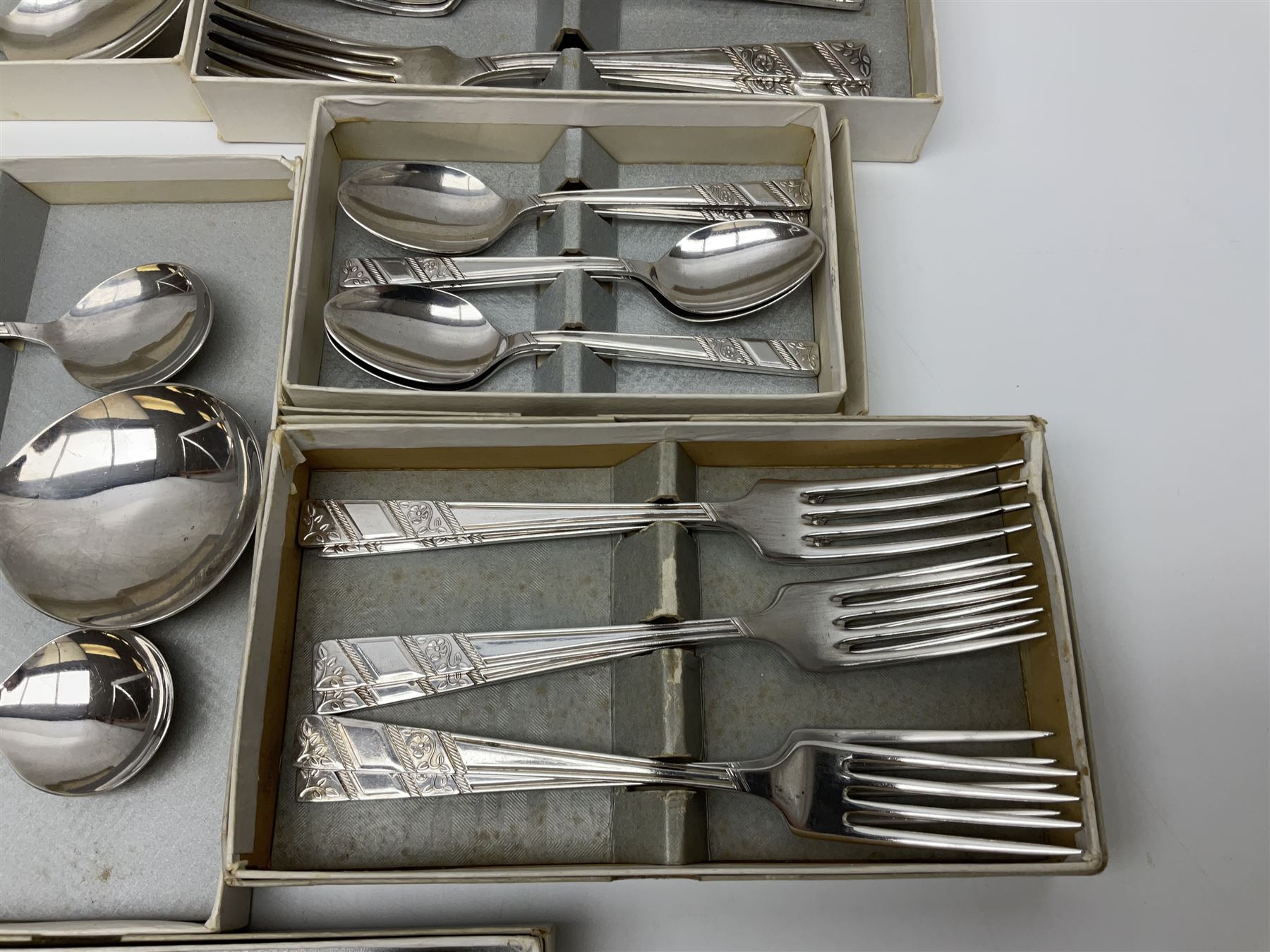 Viners Ltd silver plate Silver Rose pattern cutlery service for six place settings, to include butter knives, table knives and forks, soup spoons, dessert forks and spoons, tea knives, forks and spoons, two serving spoons and a seven piece fruit set, some boxed, missing table spoons