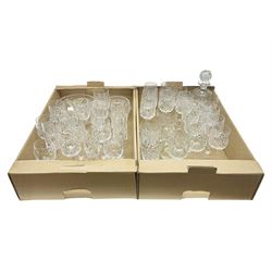 Collection of crystal wine glasses, champagne flutes, tumblers, etc, including Edinburgh Crystal, in two boxes 
