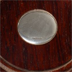 Pair of Elizabeth II silver bottle coasters with turned wooden bases D12cm, Birmingham 1994 Maker W I Broadway & Co.