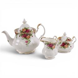 Royal Albert Country Rose tea service for six, comprising teapot, milk jug, covered sucrier, dessert plates, two sandwich plates, cups and saucers 