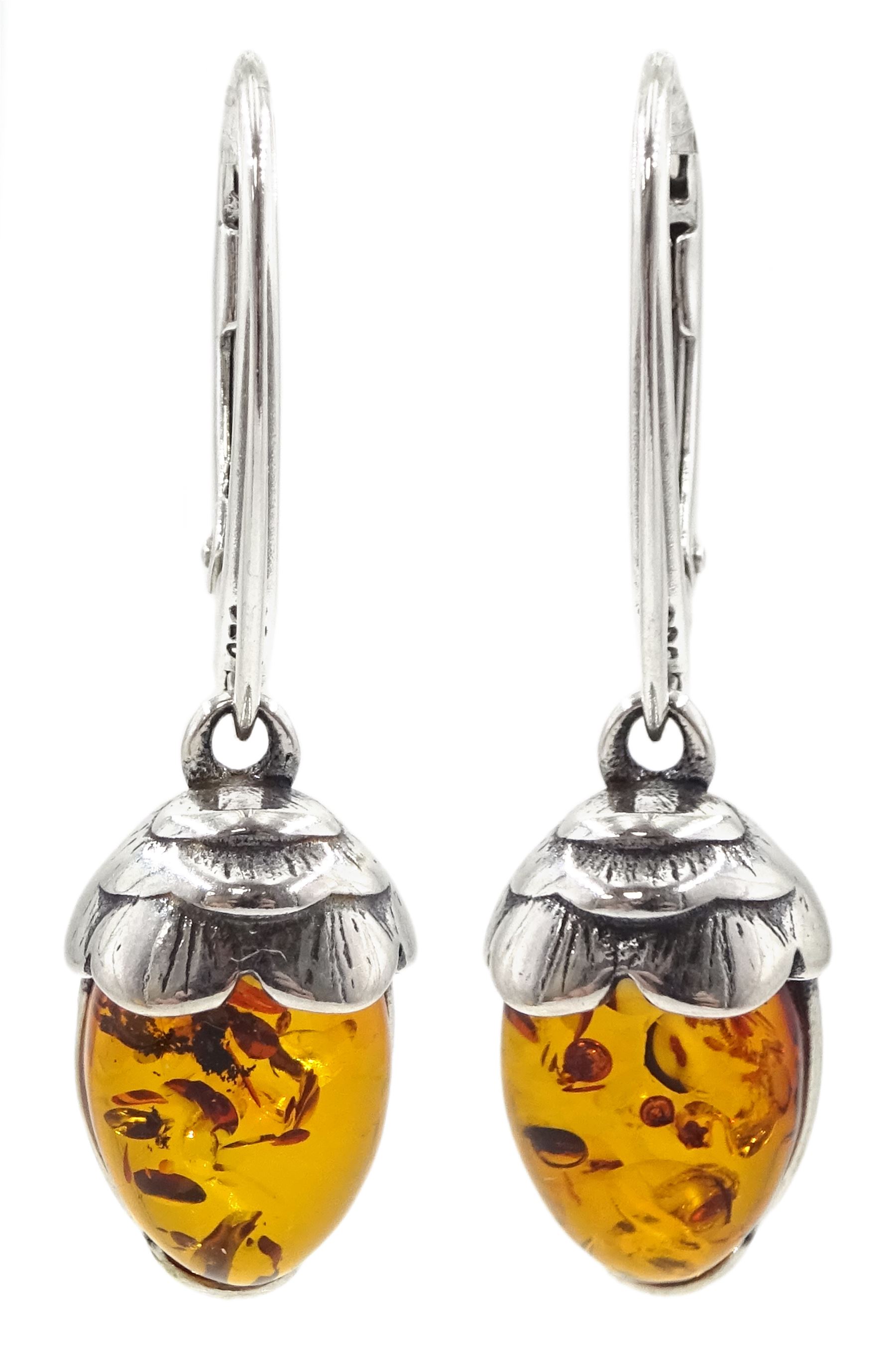 Pair of silver Baltic amber acorn pendant earrings, stamped 925 