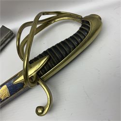 Early 19th century French Lancers officer's sword c1810, the 84cm curving fullered blade retaining most of its bluing, gilding and engraved decoration, inscribed I.S.& C. to ricasso (for Schimelbusch), brass three-bar hilt with elongated elliptical langets and wire-bound leather grip; in polished steel scabbard with two brass suspension rings L100cm overall
