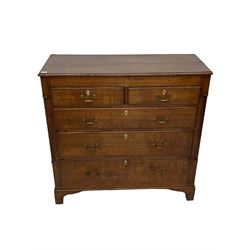 Early 19th century oak chest, fitted with two short and three long drawers, receded columns, bracket feet