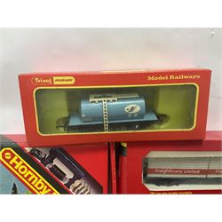 Hornby/Tri-Ang ‘00’ gauge - fifteen goods wagons to include freightliners with containers, ore wagons, closed vans etc; together with R404 Operating ore wagon set; all boxed (16) 