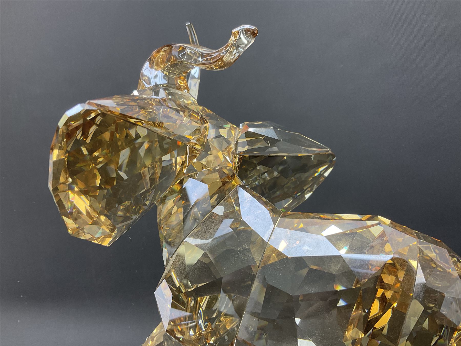 Swarovski Crystal Soulmates, Elephant, with champagne tint, upon granite base, H24.5cm