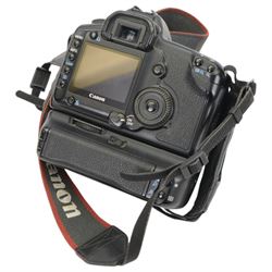 Canon EOS 5D camera body serial no. 0430100905, with shoulder strap, battery grip BG-E4 and Canon 50mm 1.1.8 EF lens serial no.31235679
