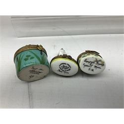Group of Limoges trinket boxes, to include a number of novelty examples, including examples modelled as Noah's ark, shotgun case containing shotguns, picnic basket containing food, toad reading book seated upon a lily pad, etc., (9)