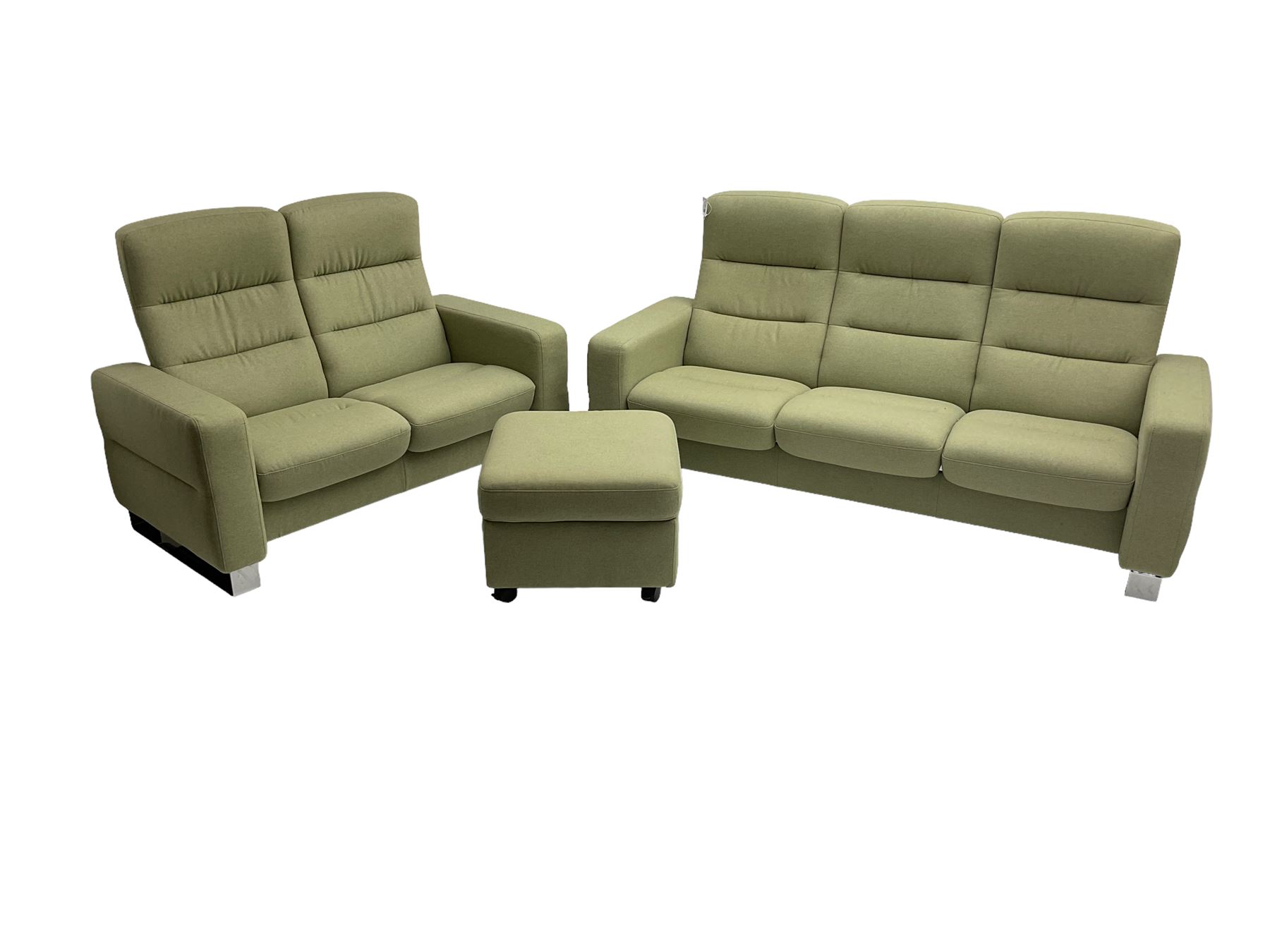 Ekornes Stressless - three seat reclining sofa upholstered in pale green fabric (198cm x 82cm x 100cm), Ekornes Stressless - matching two seat reclining sofa (144cm x 82cm x 100cm), Ekornes Stressless - storage ottoman with hinged seat upholstered in pale green fabric (60cm x 60cm x 42cm)