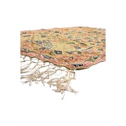 Small pastel prayer rug, cream field with Mihrab arch and trailing floral motifs in pink, blue, and green, bordered by floral patterns, knotted fringe to both ends