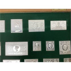The Stamps of Royalty collection consisting of twenty-five sterling silver hallmarked stamp replicas, housed in a fitted wooden display case, with certificates, polishing cloth and certificates