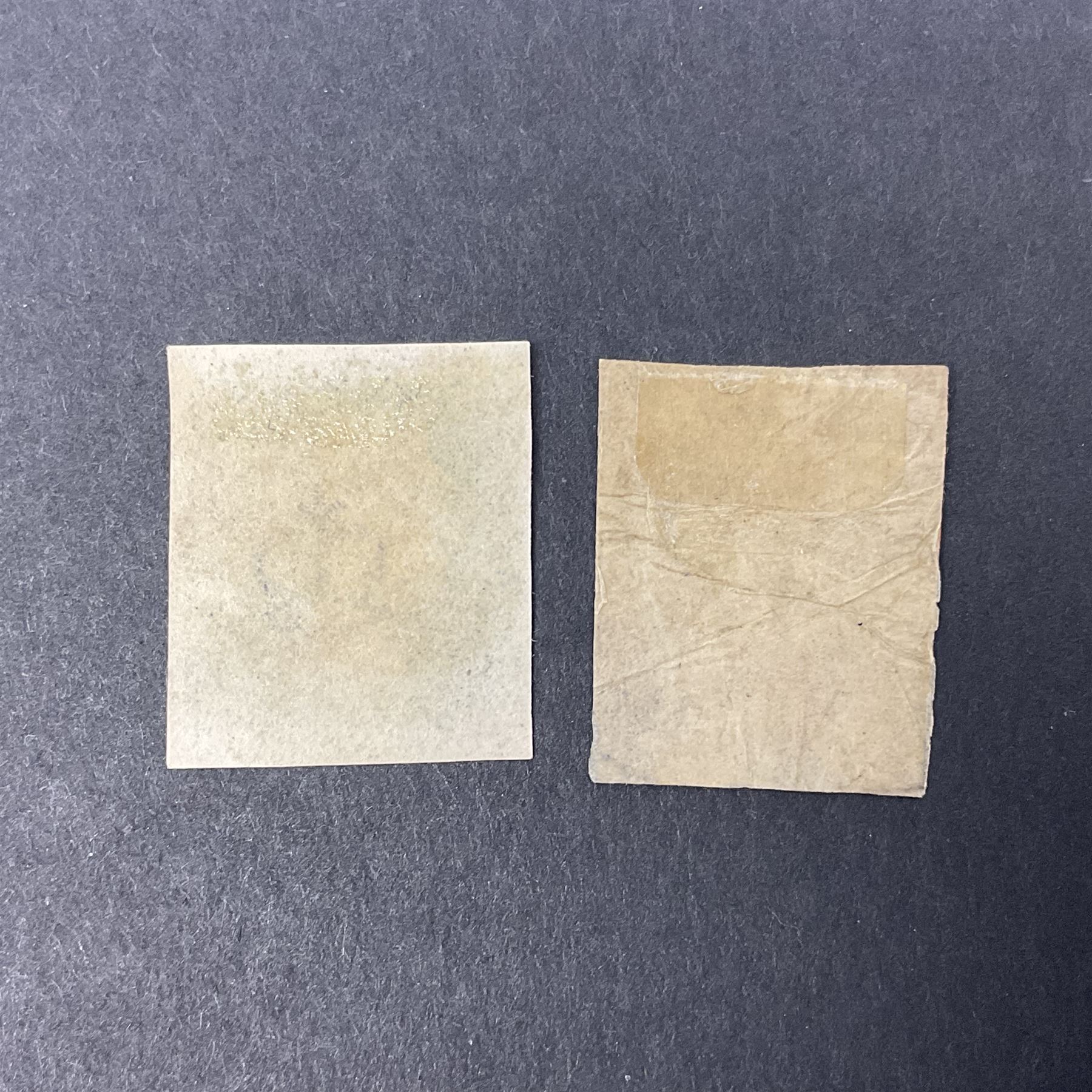 Two Great Britain Queen Victoria penny black stamps, both with red MX cancel