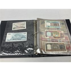 World banknotes, including Queen Elizabeth II The States of Jersey one pound 'DB202703', five pounds 'BB527762' and ten pounds 'AB651481', reserve bank of New Zealand two dollars '1L3 741894', King George V Straits Settlements one dollar 1st January 1935 'F/83 28924', various Bank of England notes etc, housed in two ring binder albums