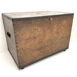 Large 19th century iron bound oak travelling chest, of oblong form, the hinged lid with brass plate inscribed 'Mr. J. Watson, Surgeon, R.N' opening to reveal a plain interior on bun feet, with side carrying handles W102cm H72cm D63cm
