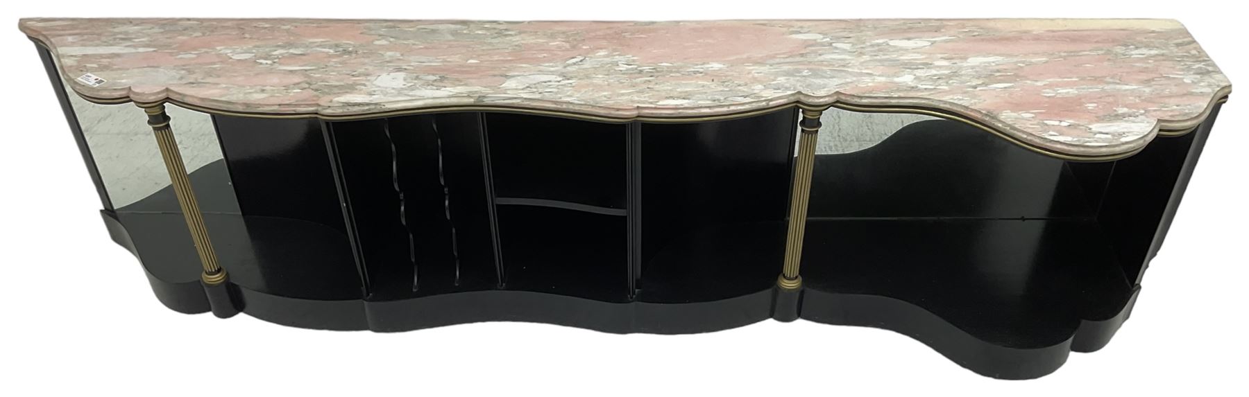 Italian ebonised and gilt serpentine corner console bookcase cabinet, shaped pink marble top over assorted shelves and dividers with fluted pilasters and mirror backs, on skirted base 