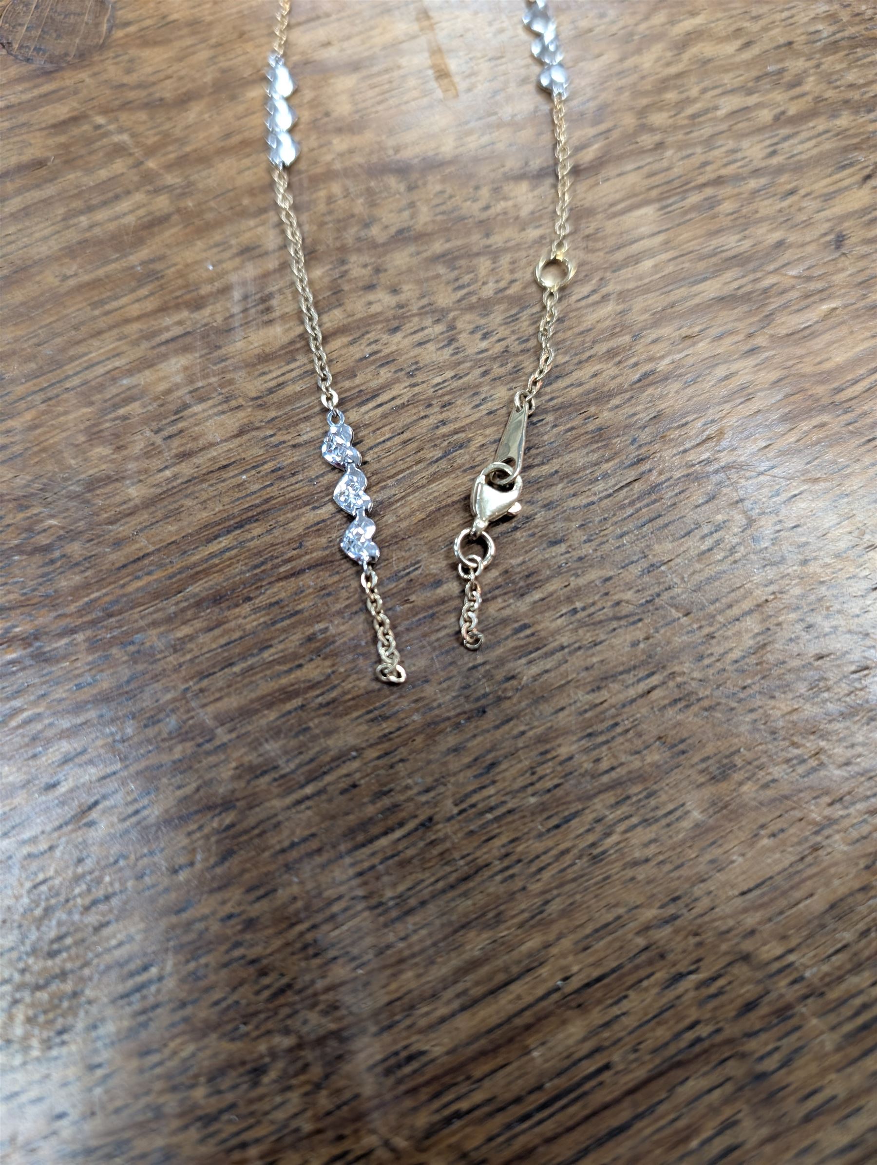 9ct white and yellow gold heart bracelet, hallmarked