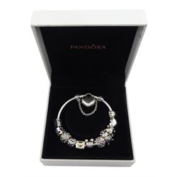 Pandora Moments 'You Are Loved' padlock silver charm bracelet, with eleven Pandora Club 2020 limited edition charms and safety chain, in Pandora box