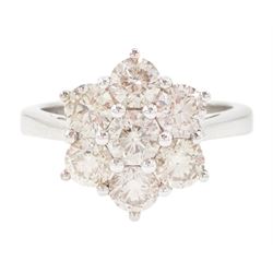 18ct white gold diamond daisy cluster ring, set with seven round brilliant cut diamonds, s...