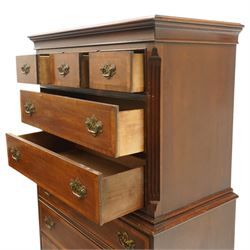 Georgian design mahogany chest on chest, moulded projecting cornice over three short and two long drawers, canted fluted front corners, lower section fitted with three long drawers, brass pierced backplate handles and escutcheons, on shaped bracket feet