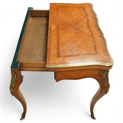 Early 20th-century Louis XV-style kingwood and tulipwood marquetry card table, shaped rectangular hinged top revealing baize-lined interior, with quarter-veneered parquetry within crossbanded borders and mounted with a gilt bronze edge, above a serpentine frieze,  raised on cabriole legs with gilt bronze foliate mounts and sabots 