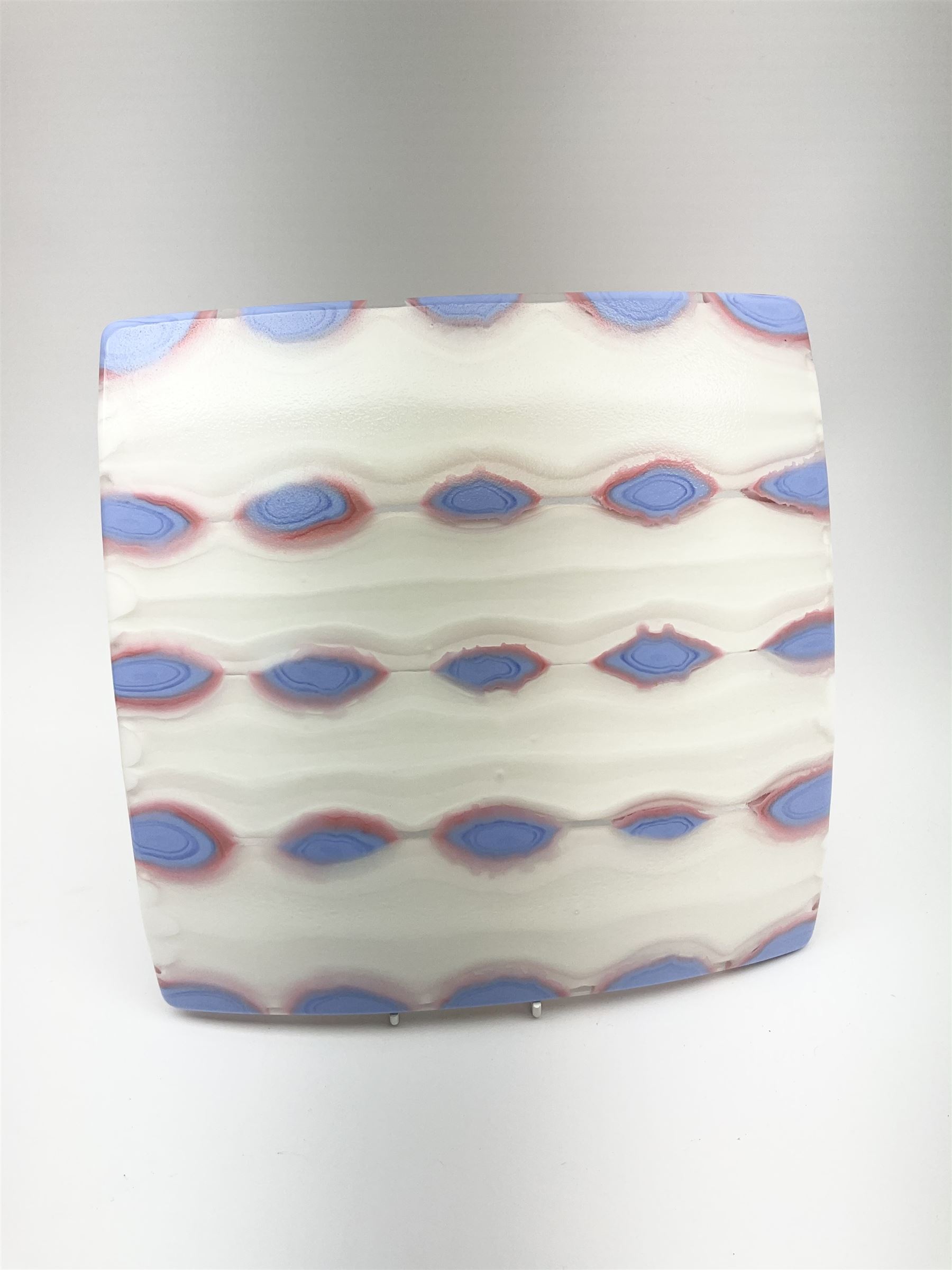 Zdenek Lhotsky glass platter, decorated with geometric motifs in pink and blue upon a white ground, L26cm, with certificate and box.