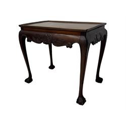Late 19th to early 20th century mahogany side table, rectangular top with applied raised moulding, curved upper rails carved with C-scroll cartouches and extending curled leaves, bellflower carved cabriole supports with ball and claw feet 