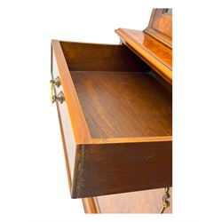 Ian Smith Furniture - Georgian design walnut bookcase on cupboard, projecting cornice above a pierced geometric frieze, featuring two astragal-glazed doors enclosing two adjustable shelves, the base with two drawers above a double cupboard, on a shaped plinth base
