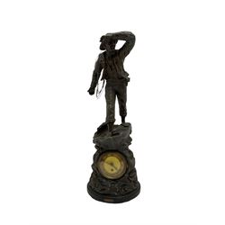 An inspiring early 20th century spelter effect figure of a sailor standing in the bow of a boat scanning the horizon, on a simulated rock base with a plaque entitled 'Rescue', base fitted with a timepiece clock movement and two-part dial, with pierced hands, gilt dial centre and ivorine chapter ring written in Arabic numerals, German HAC spring driven going barrel movement wound from the front. 
With pendulum.



