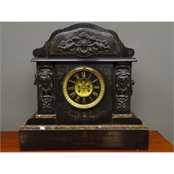  Large 19th century black slate and marble mantle clock, shaped pediment with metal mount depicting putti and floral urn, black chapter ring with gilt Roman numeral, visible brocot escapement, enclosed by mask mounts, engraved decoration, twin train movement stamped 'Samuel Marti, Medaille de Bronze', striking on coil, H49cm  
