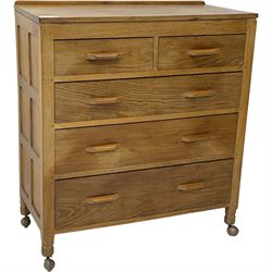 Yorkshire Oak - oak chest, fitted with two short over three long drawers, on octagonal feet with castors 