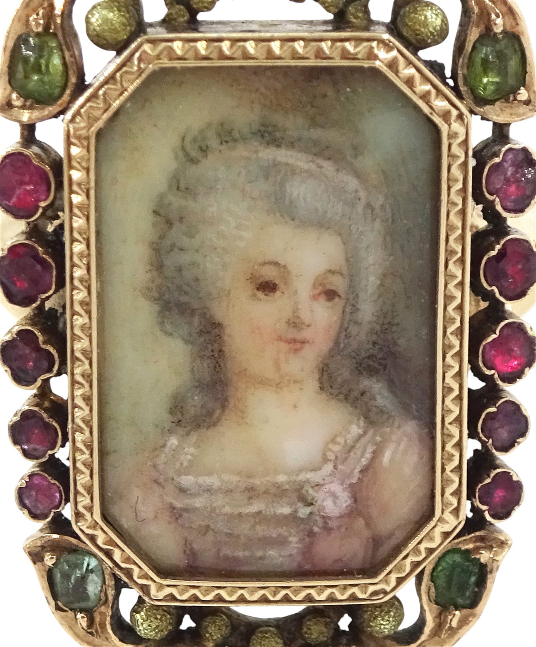 19th century 18ct gold portrait ring, set with an octagonal miniature of a woman wearing a pink dress on ivory, under a glazed panel, within a milled bezel and garnet surround, surmounted by a coronet set with seed pearls and further garnets. This lot has been registered for sale under Section 10 of the APHA Ivory Act
