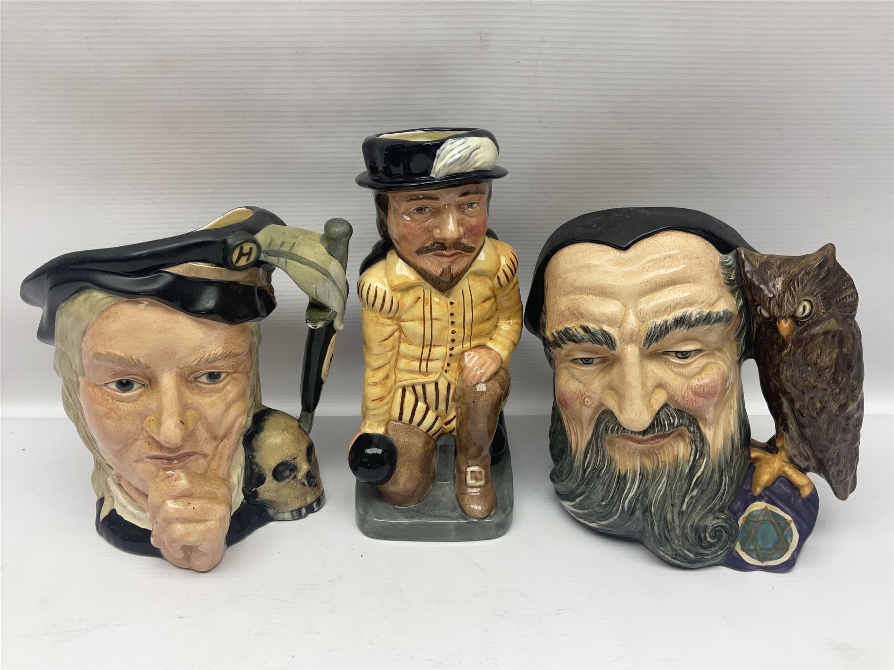 Eight Royal Doulton character jugs, including St George D6618, Guardsman D6568, The Juggler D6835 etc, together with Royal Doulton toby jug Sir Francis Drake D6660