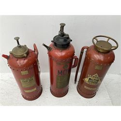 Three fire extinguishers to include an Enright Fire Services extinguisher dated 1949, a Valor Partridge Ltd. example dated 1970 and a M.O.W. example, tallest H63cm