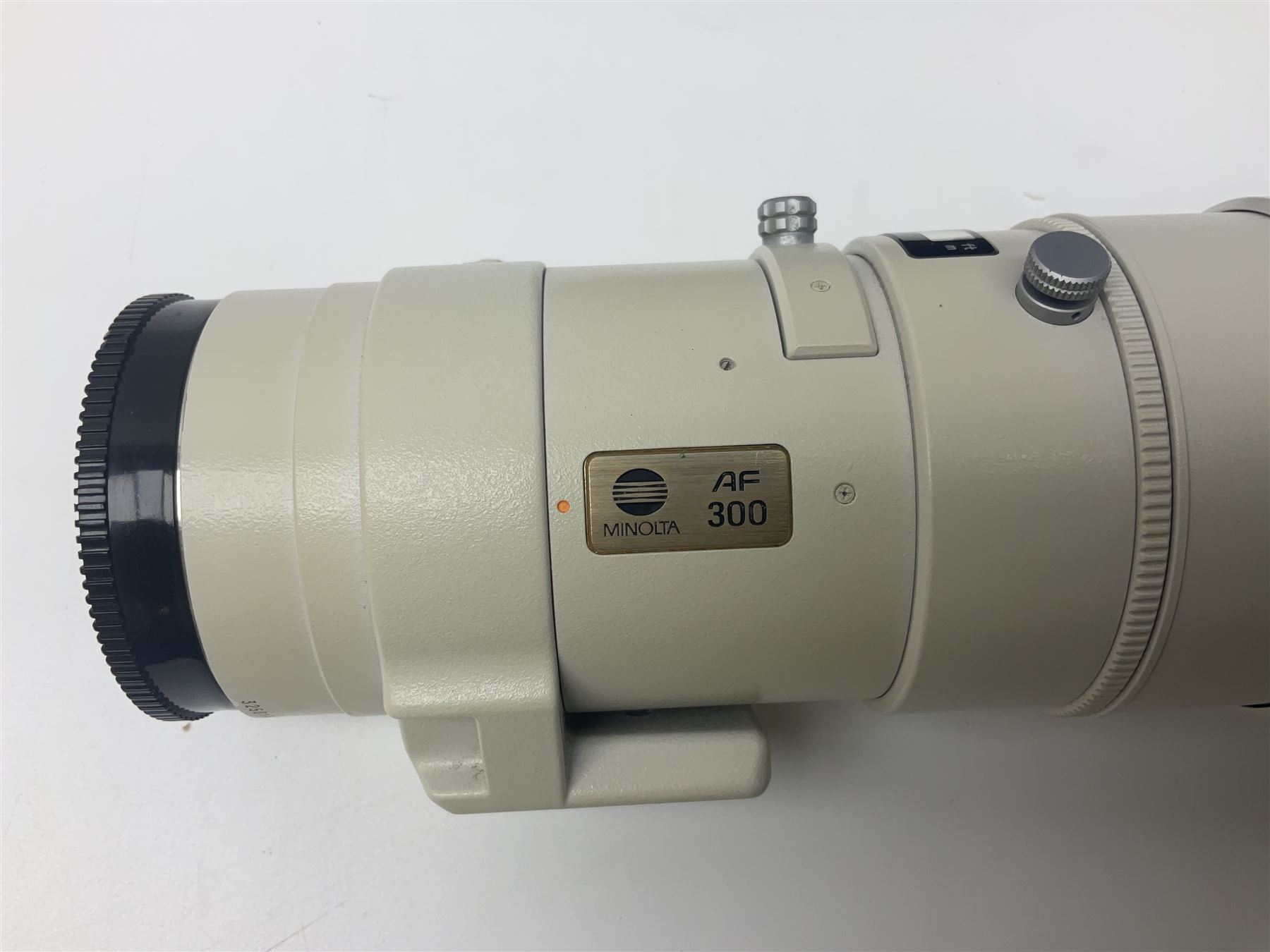 Minolta Dynax 7 camera body, serial number 93101009, Minolta 'AF APO Tele 300mm 1:4 (32)' lens serial no 32501041, in case and other camera equipment 