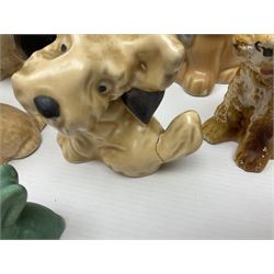 Collection of Sylvac and similar animal figures, including rabbits, hares and dogs, together with Falcon budgie vase, etc 