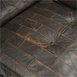 Mid 20th century leather upholstered two-piece sectional sofa with footstool, buttoned back cushions with stitched panel decoration, padded armrests and deep seat cushions, raised on concealed supports