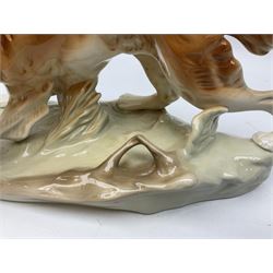 Royal Dux porcelain hunting dog with a bird, printed mark beneath, L36cm