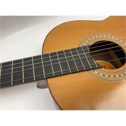 Spanish BM acoustic guitar with mahogany back and sides and spruce top L101cm; in cello carrying case; Roland foot pedal and two Yamaha foot pedals; tin D# organ pipe; folding music stand etc