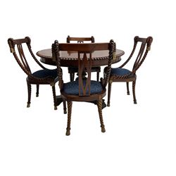 Regency style dining set - the table with circular tilt-top on turned and carved column, concaved triangular platform with three scroll carved feet, together with set four rope twist dining chairs with upholstered drop in seats