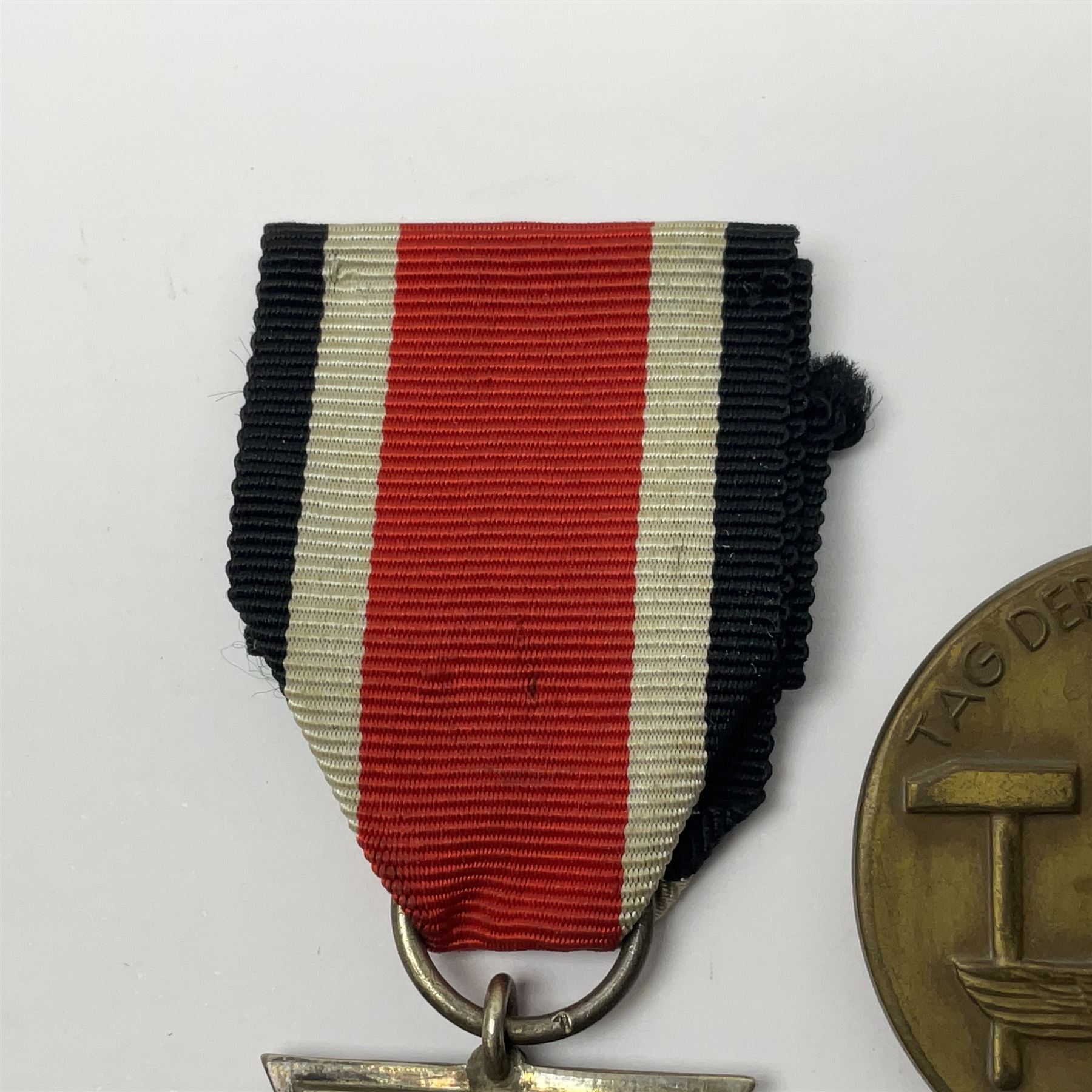 WWII German Iron Cross 2nd Class with ribbon; WWI German Wuerttemberg Medal with ribbon; and Day Badge for 1934 marked Reichsverband Pforzheim32 (3)