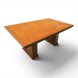 Modern Art Deco design walnut extending dining table, rectangular top with rounded moulded edge, geometric parquetry veneered panels, extending action with additional leaf extending to 220cm, on twin panelled pedestal supports with stepped plinth feet