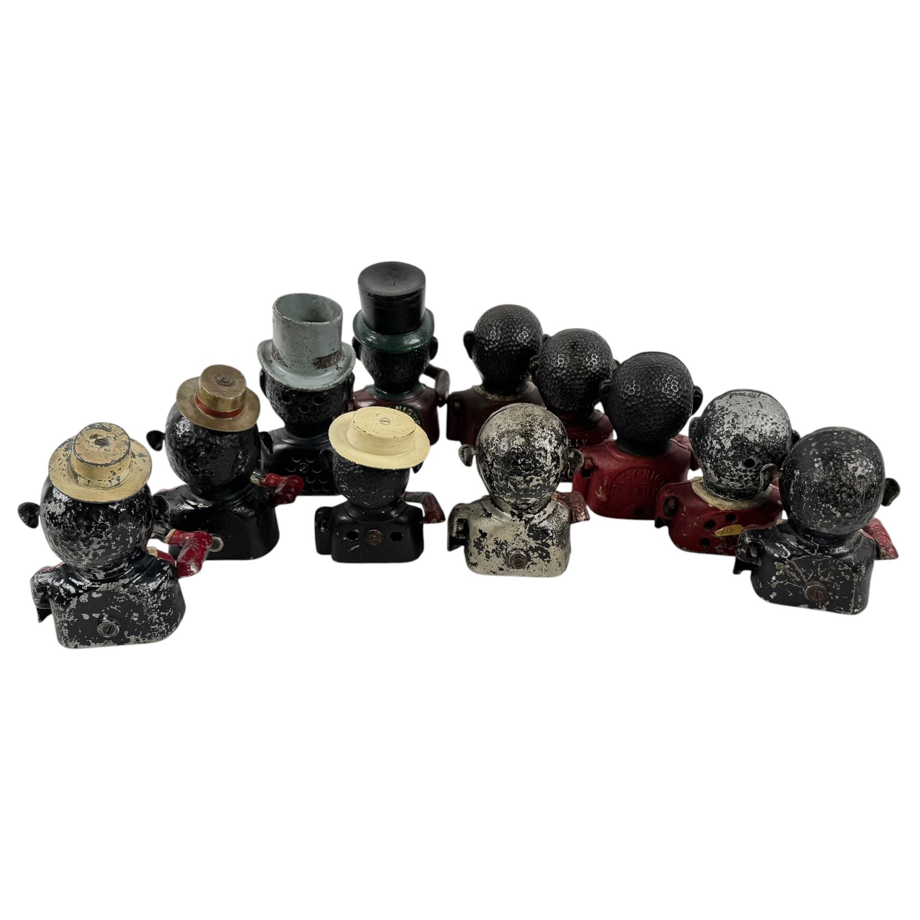 Collection of cast iron Jolly money boxes with and without hats