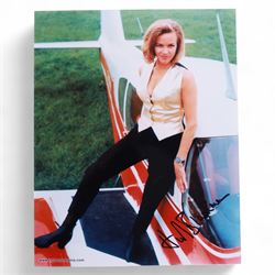 Eight James Bond signed 10 x 8