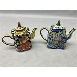 Pair of brass planters with twisted rope decoration, together with four cloisonné style teapots decorated with polychrome enamel etc